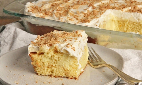 Banana Poke Cake Recipe | Laura in the Kitchen - Internet Cooking Show