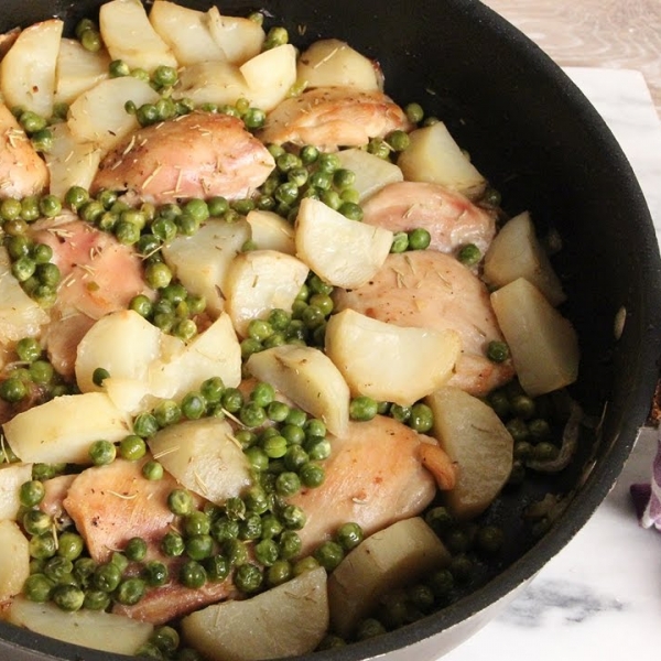 One Pan Roasted Chicken with Potatoes and Peas