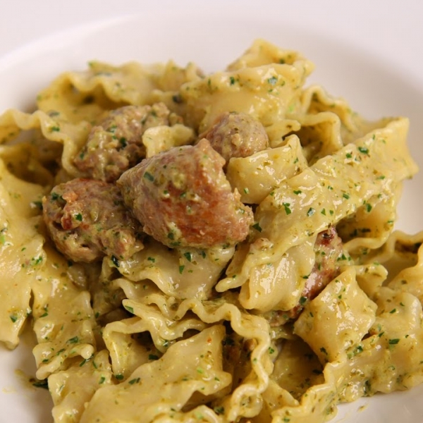 Pasta With Sausage in a Creamy Pesto Sauce